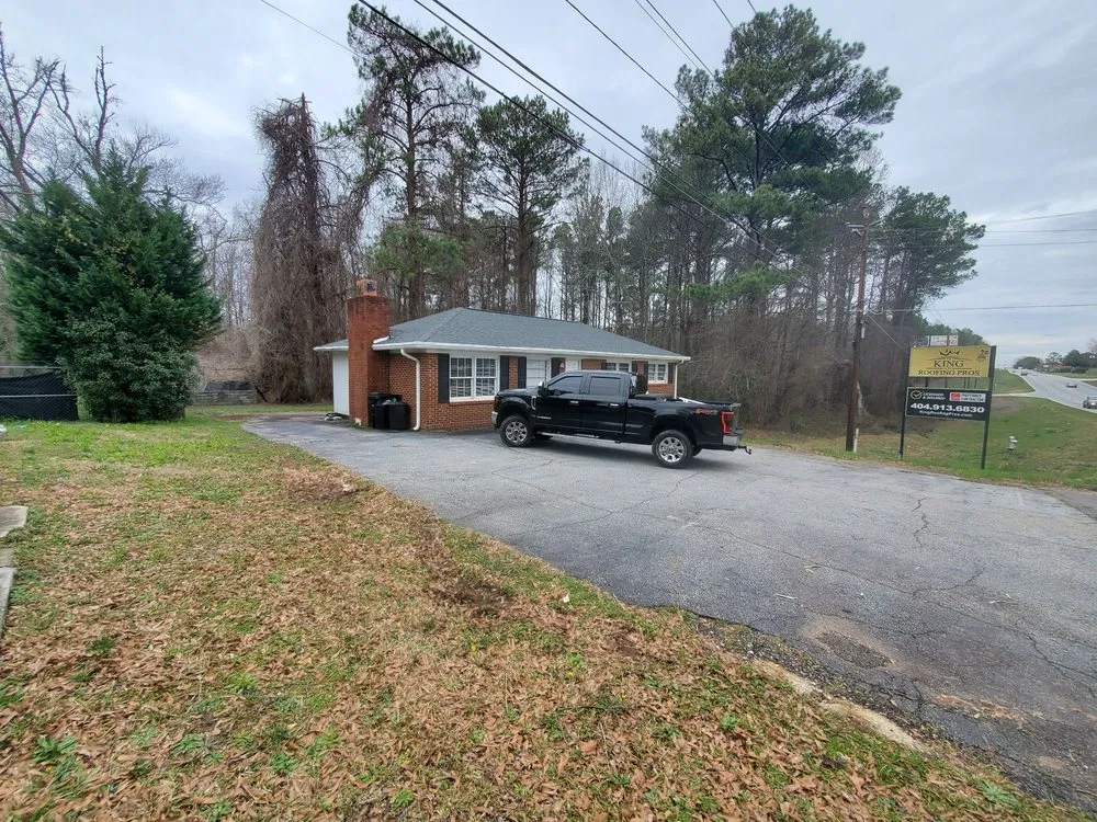 Slide of King Roofing Pros