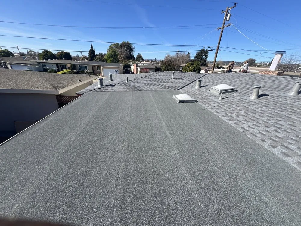 Slide of Kingbee Roofing