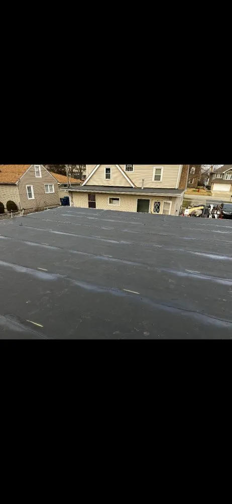 Slide of Kingdom Roofing & Tuckpointing