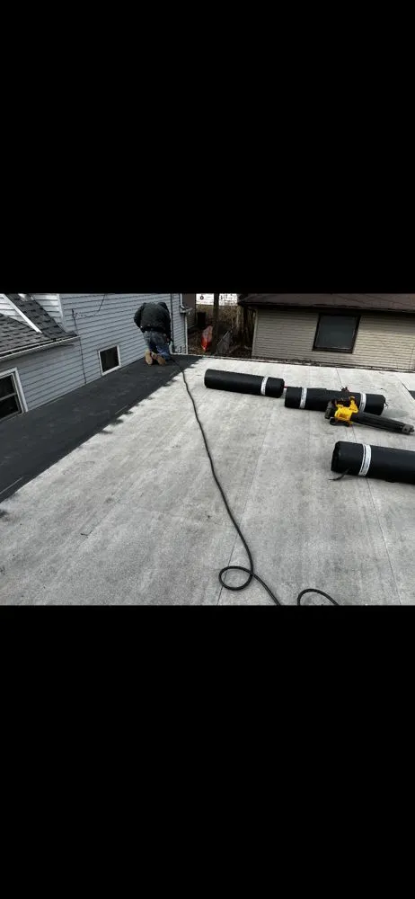 Slide of Kingdom Roofing & Tuckpointing