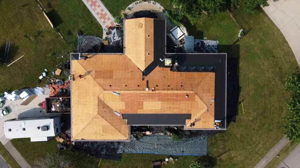 Slide of Kingdom Roofing Systems