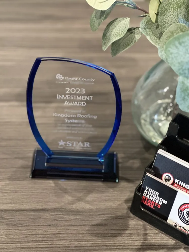 Slide of Kingdom Roofing Systems