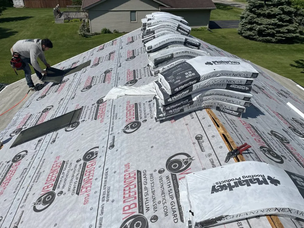 Slide of Kingpin Roofing