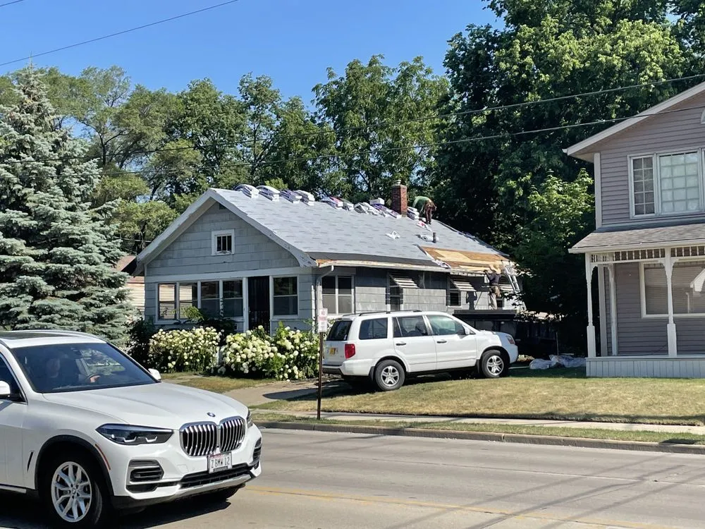 Slide of Kingpin Roofing