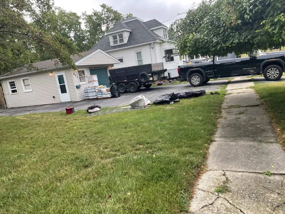 Slide of Kingpin Roofing