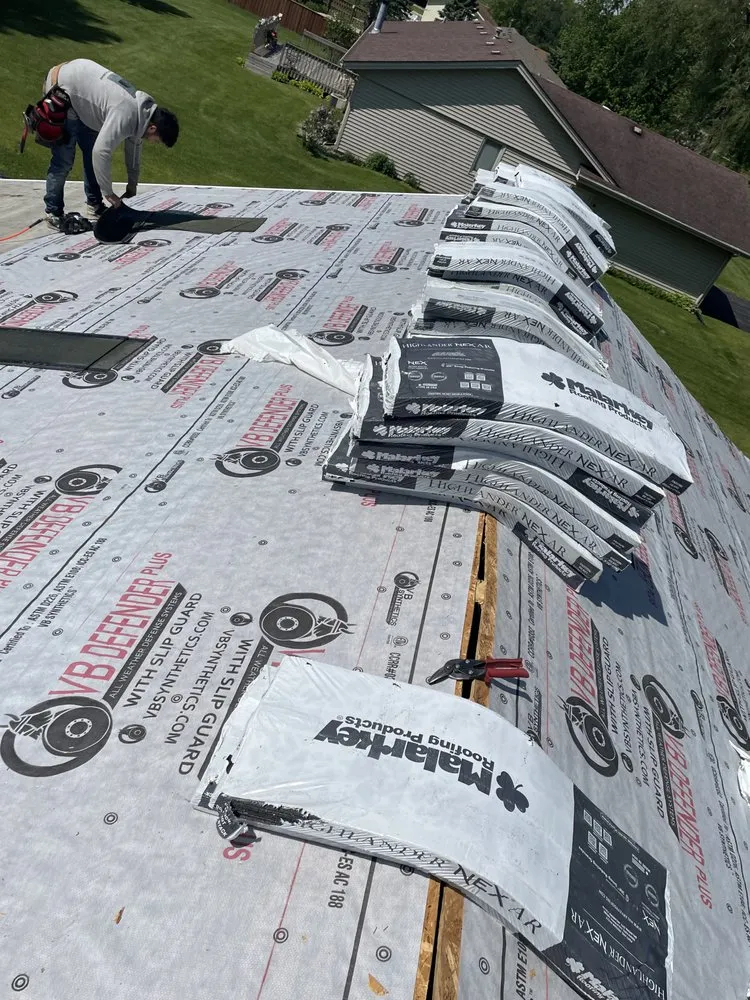 Slide of Kingpin Roofing