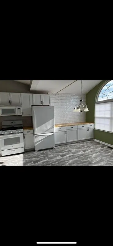 Slide of Kings Roofing & Remodeling