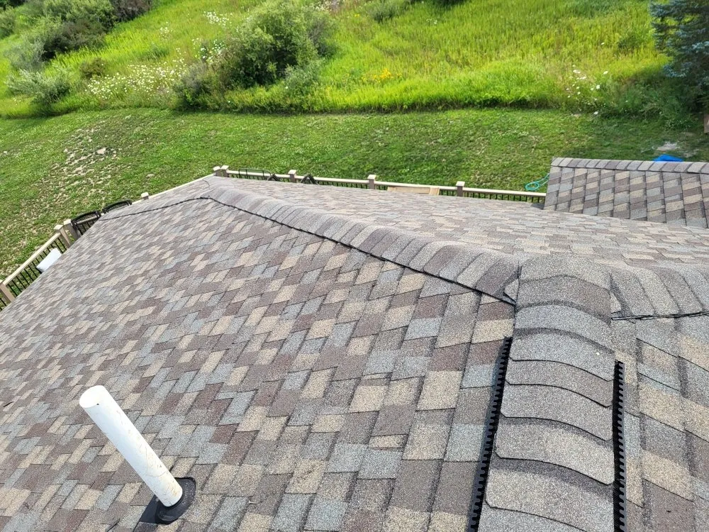 Professional metal roofing installation in Mancelona, MI by Kings Roofing And Plowing
