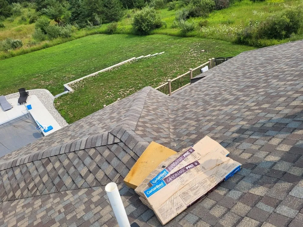 Expert residential roofing service for residential properties across Mancelona, MI - Kings Roofing And Plowing