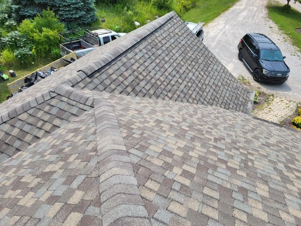 Top-rated flat roof repair with free inspection in Mancelona, MI by Kings Roofing And Plowing