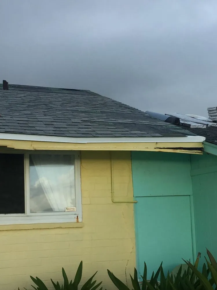 Slide of Kings Roofing