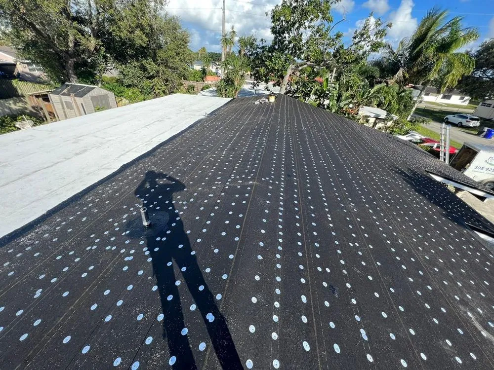 Slide of Kingsman Roofing