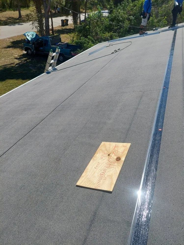 Slide of KJ Miller Roofing