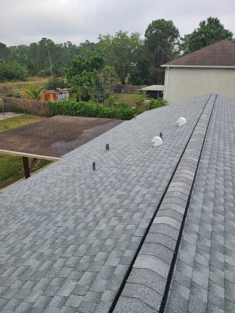 Slide of KJ Miller Roofing