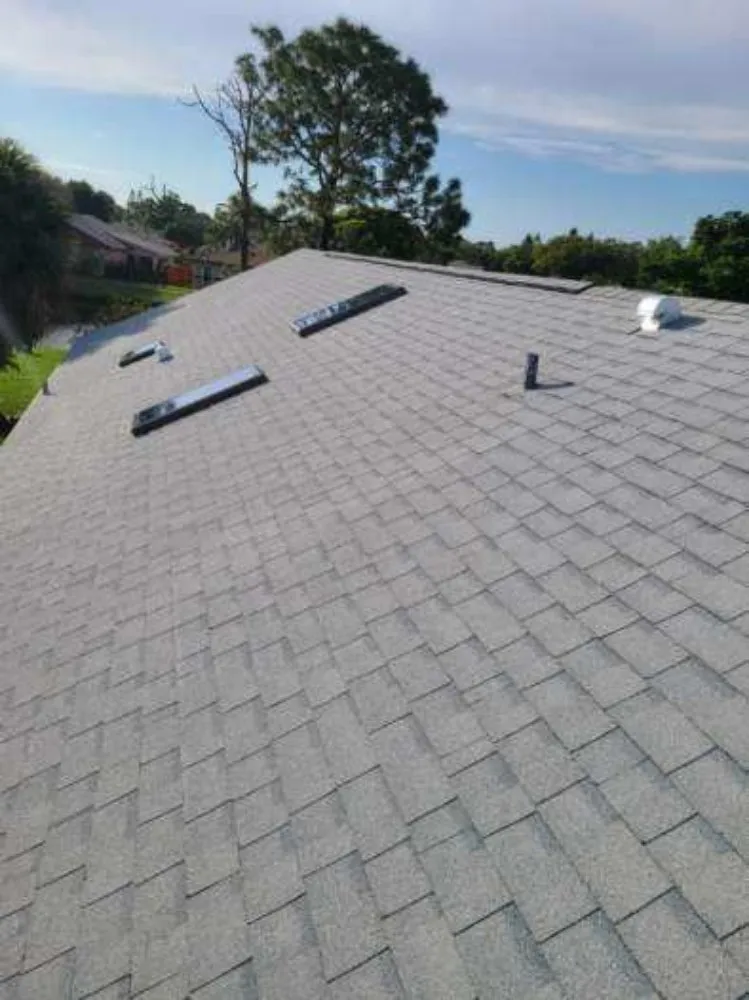 Slide of KJ Miller Roofing