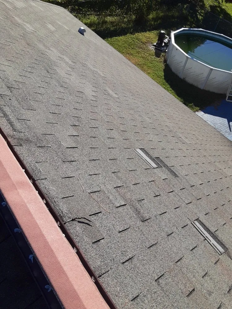 Slide of KJ Miller Roofing