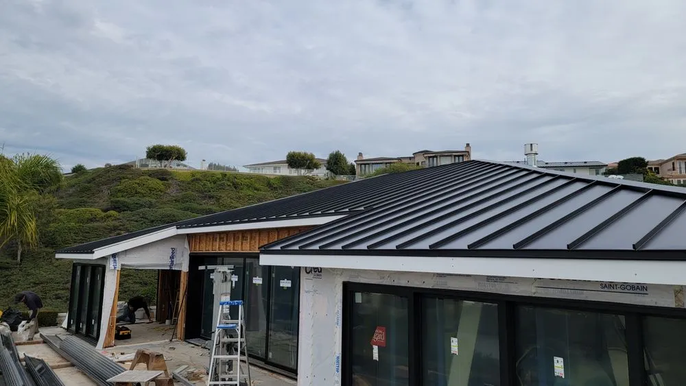 Slide of KJC Roofing