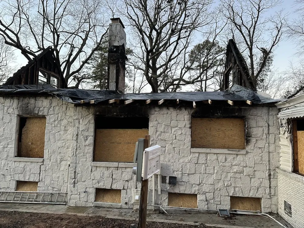 Slide of KM Roof and Home Repair