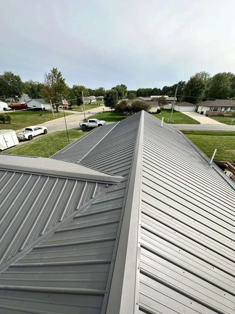 Slide of KM Roofing Solutions