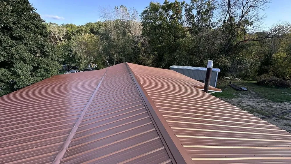 Slide of KM Roofing Solutions