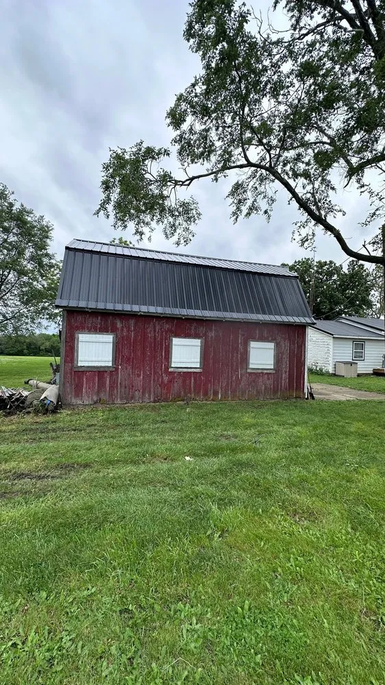 Slide of KM Roofing Solutions