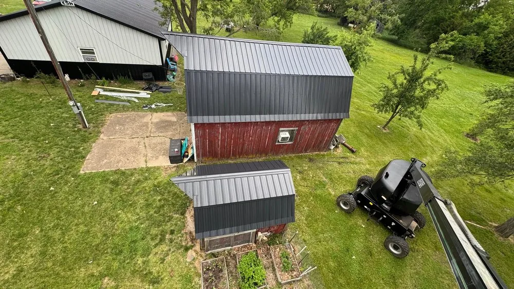 Slide of KM Roofing Solutions