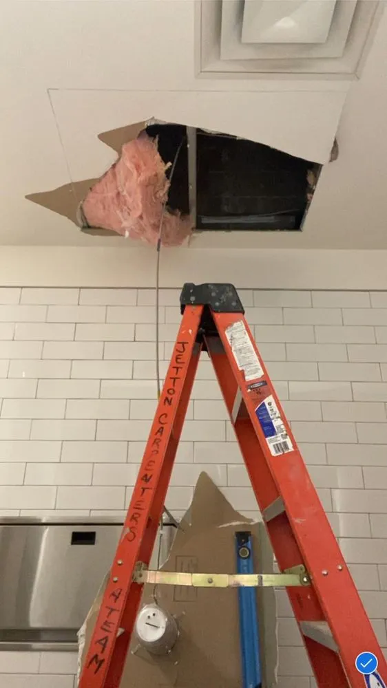 Slide of KMC Home Improvement