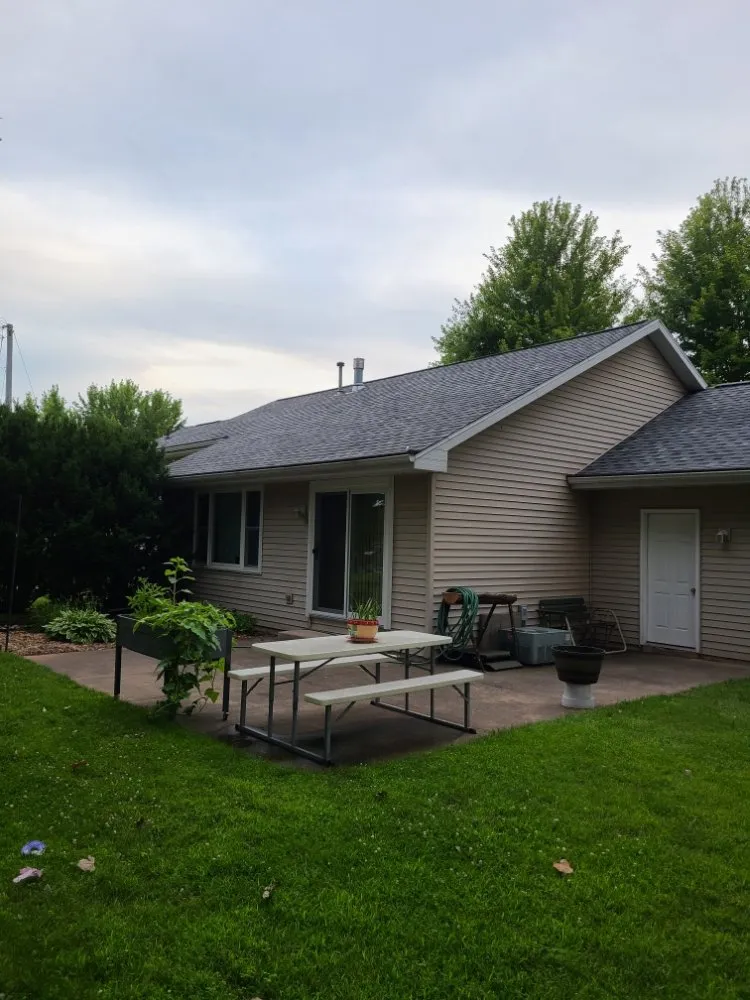 Slide of KMJ Roof Masters