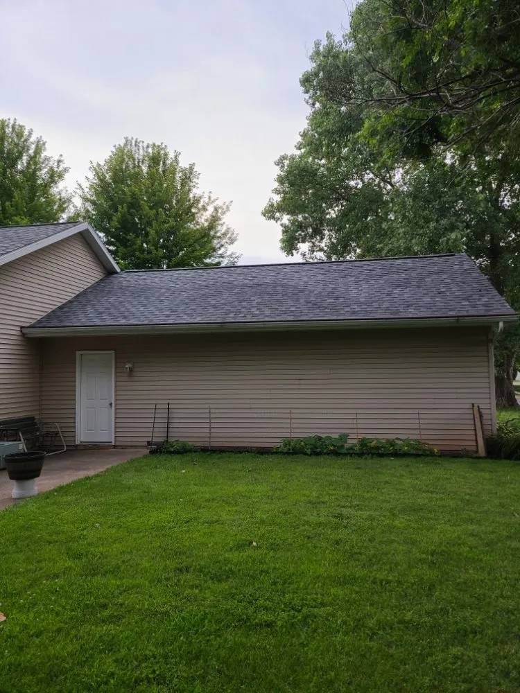 Slide of KMJ Roof Masters