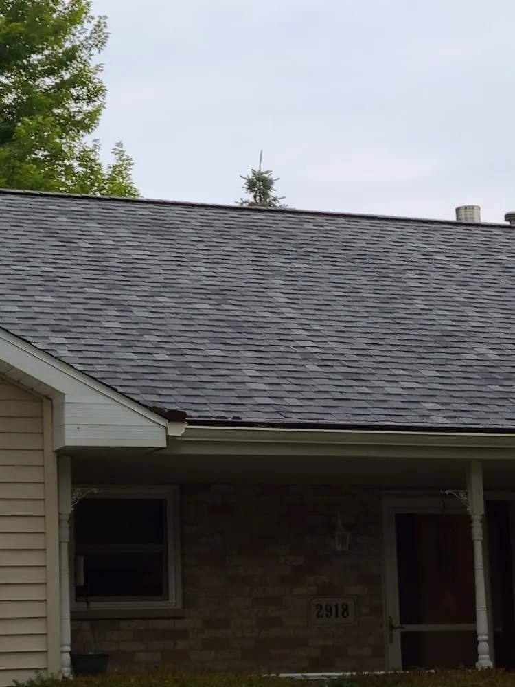 Slide of KMJ Roof Masters