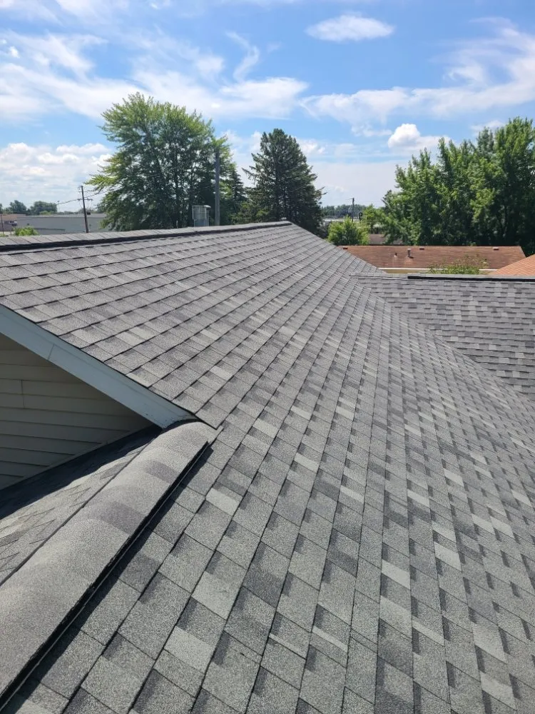 Slide of KMJ Roof Masters