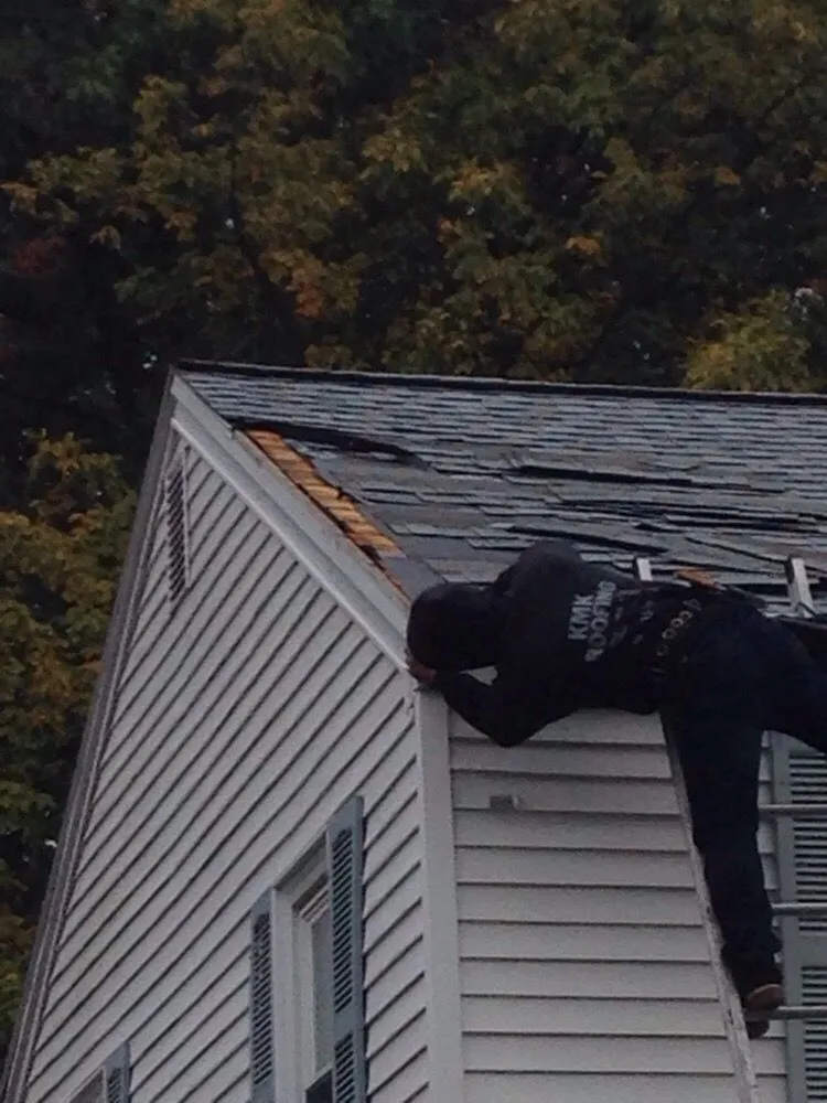 Slide of KMK Roofing