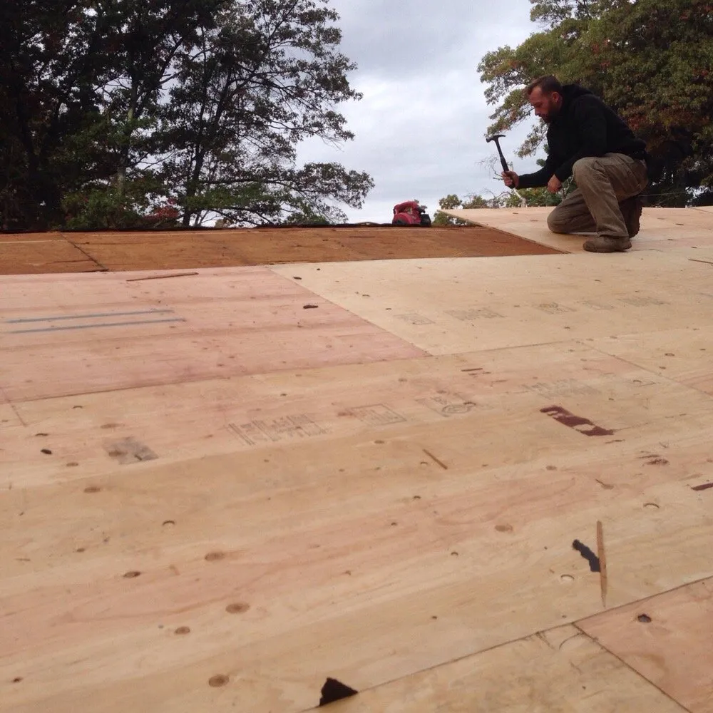 Slide of KMK Roofing