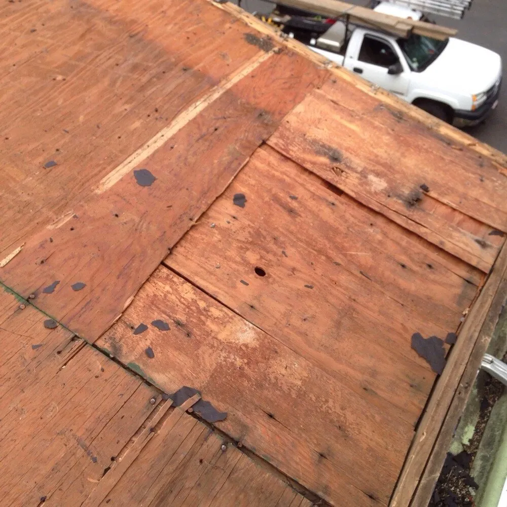 Slide of KMK Roofing