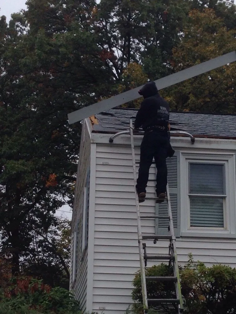 Slide of KMK Roofing