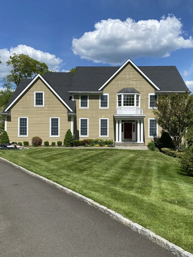 Slide of Km&m Roofing