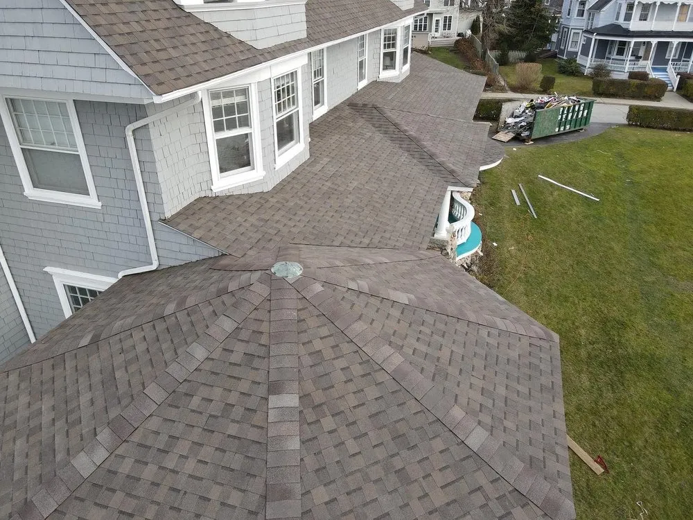 Slide of Km&m Roofing