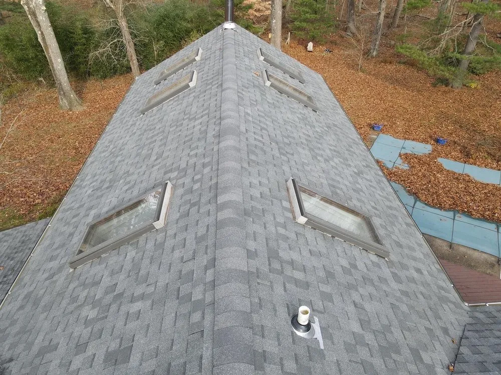 Slide of Km&m Roofing