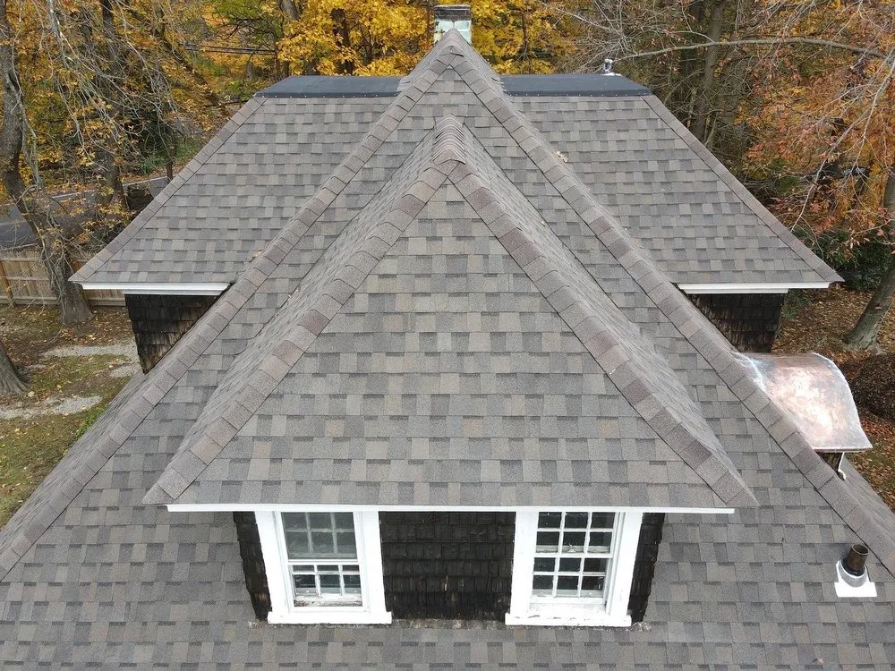 Slide of Km&m Roofing