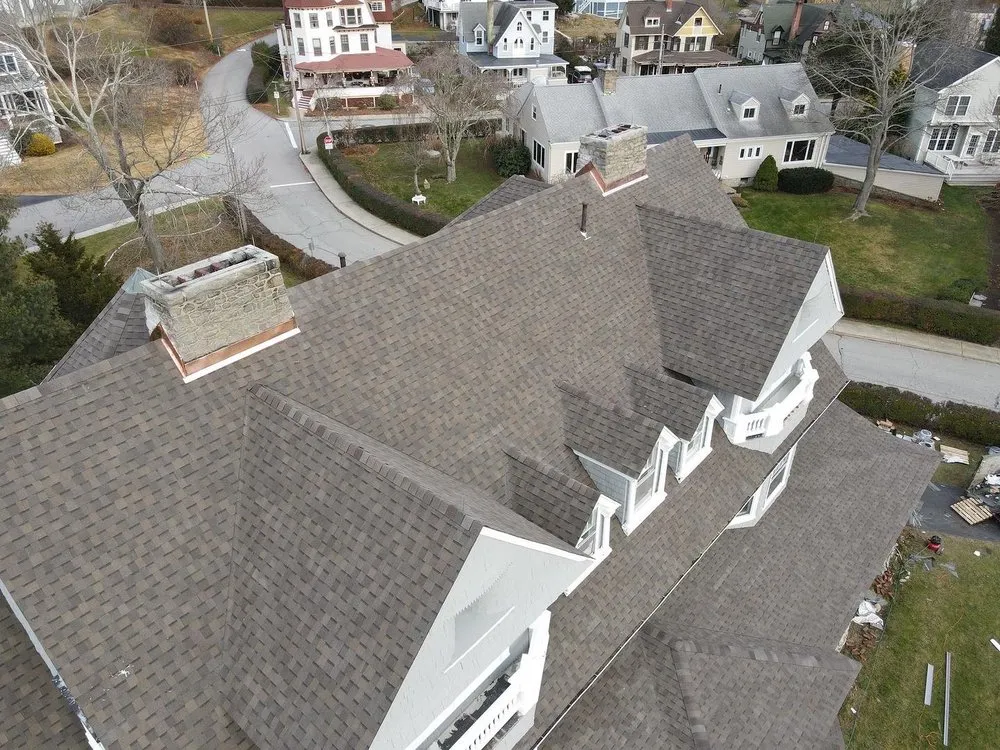 Slide of Km&m Roofing