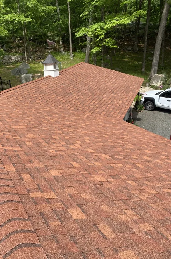 Slide of Km&m Roofing