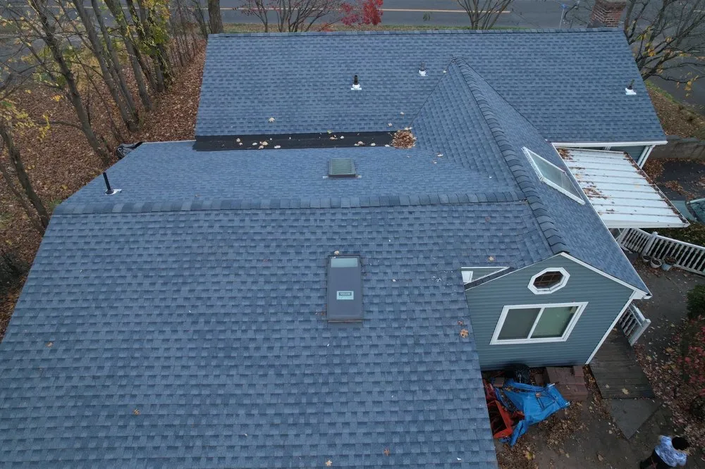 Slide of Km&m Roofing