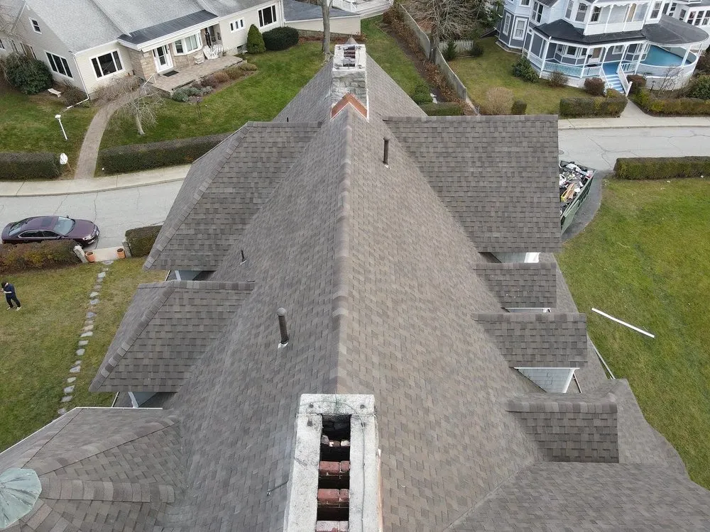 Slide of Km&m Roofing