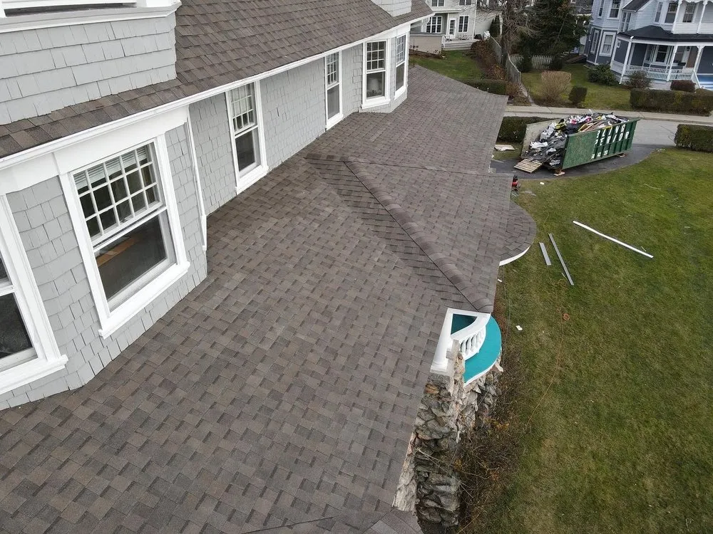 Slide of Km&m Roofing