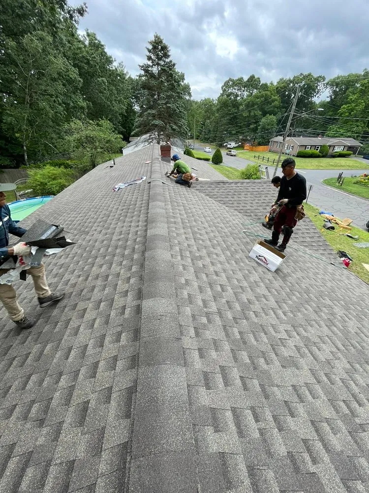 Slide of Km&m Roofing