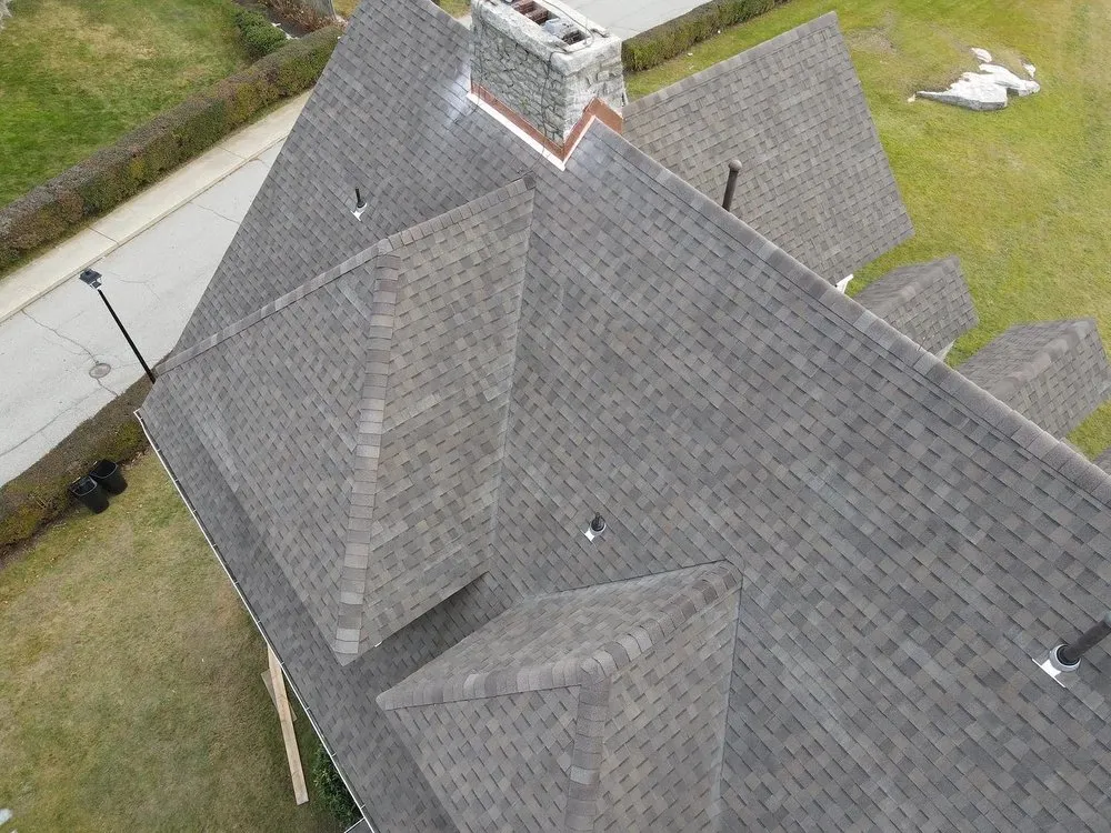 Slide of Km&m Roofing