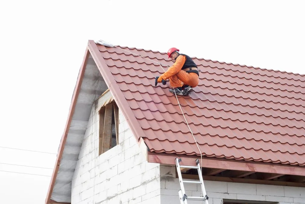 Slide of Knoxville Roofing Masters