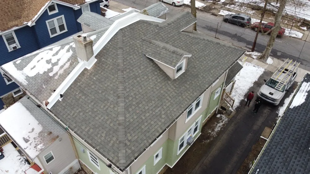 Slide of KO Roofing