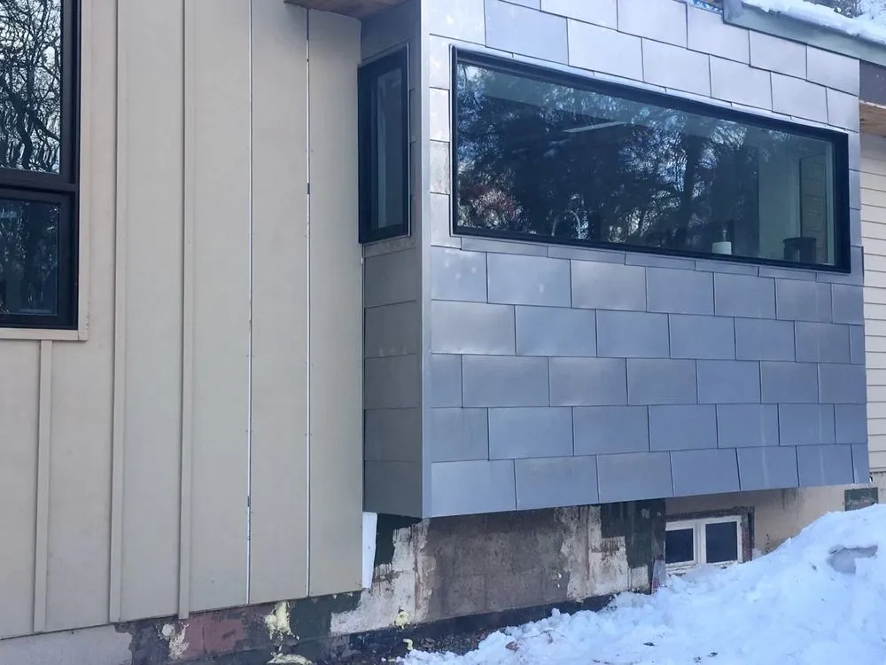 Slide of Koalafied Roofing