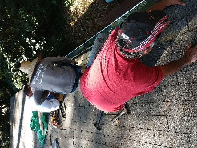 Slide of Koch Brothers Roofing